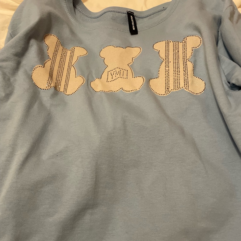 Blue sweater with teddys with crystals